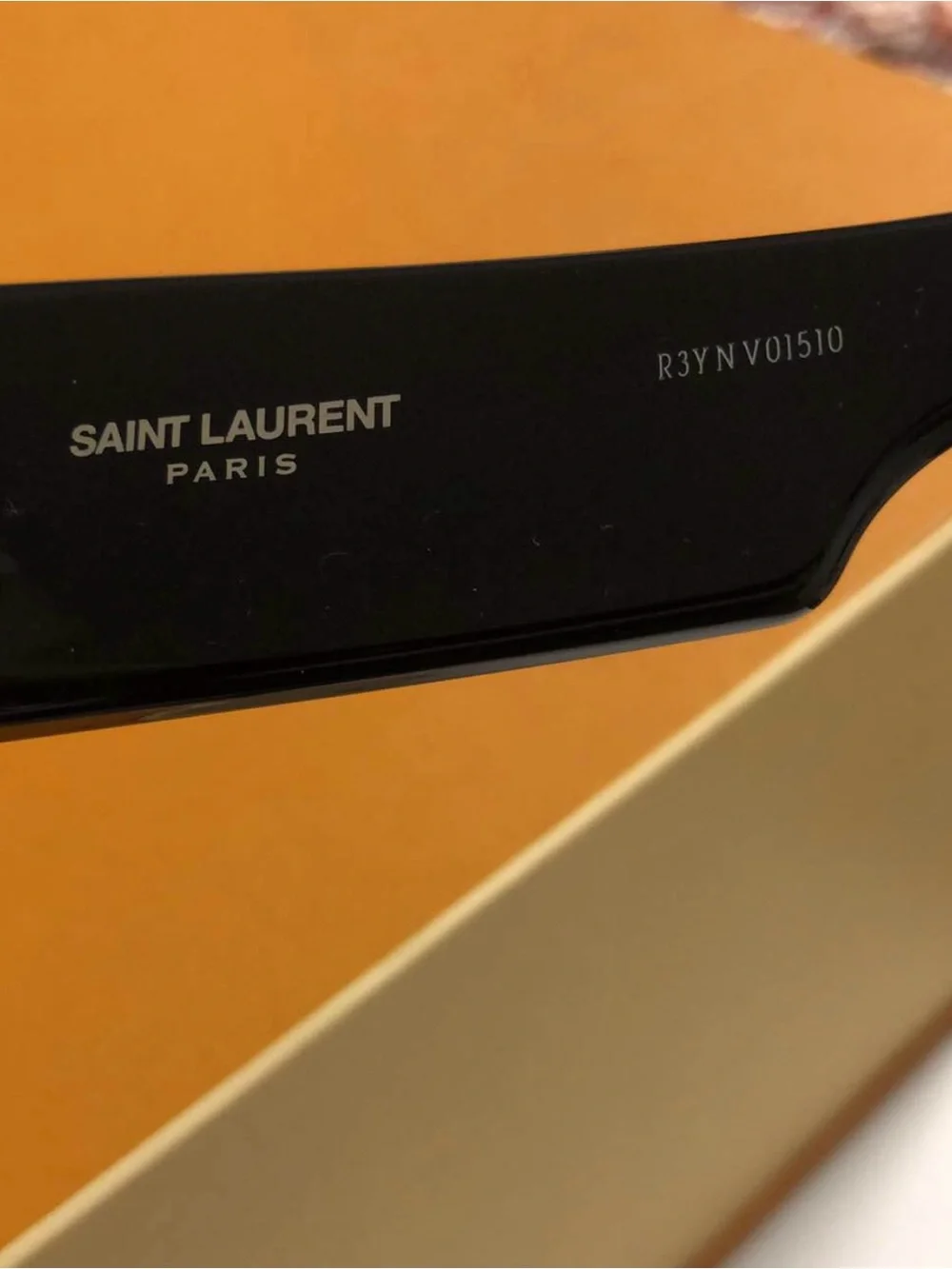 Yves Saint Laurent Black Women's Oval Sunglasses with Dark Lenses